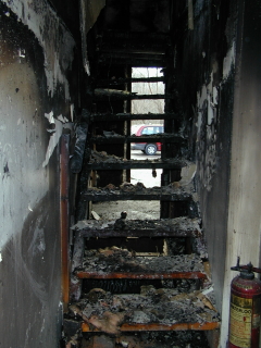 Old Stone Gallery fire picture.Stairs below which the fire started